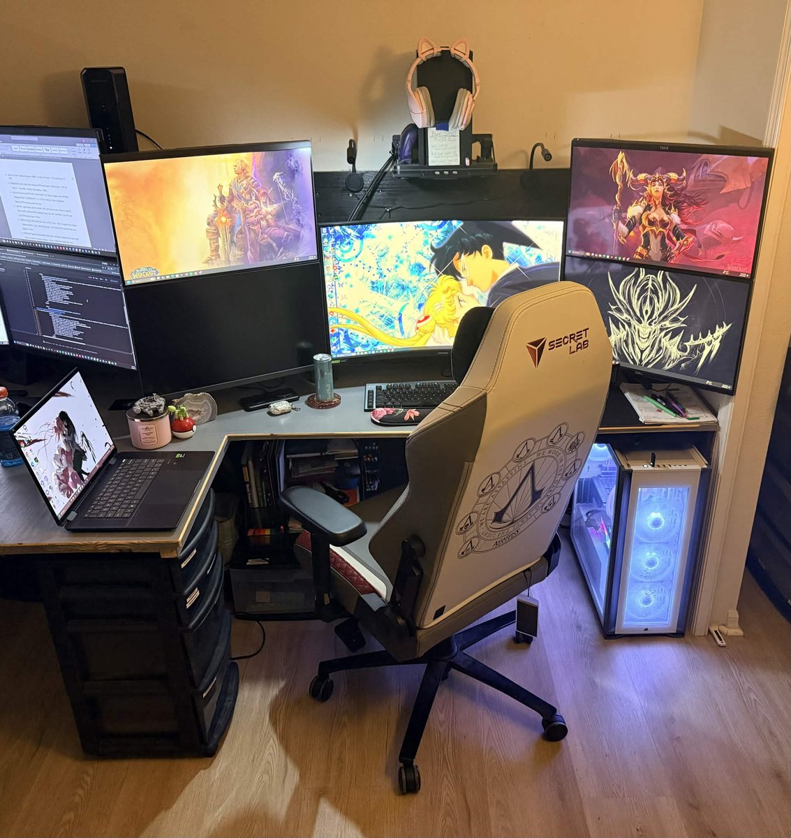 Alison's custom wall in-lay desk setup with wall-mounted monitors